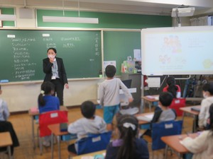 弥生小 学校訪問